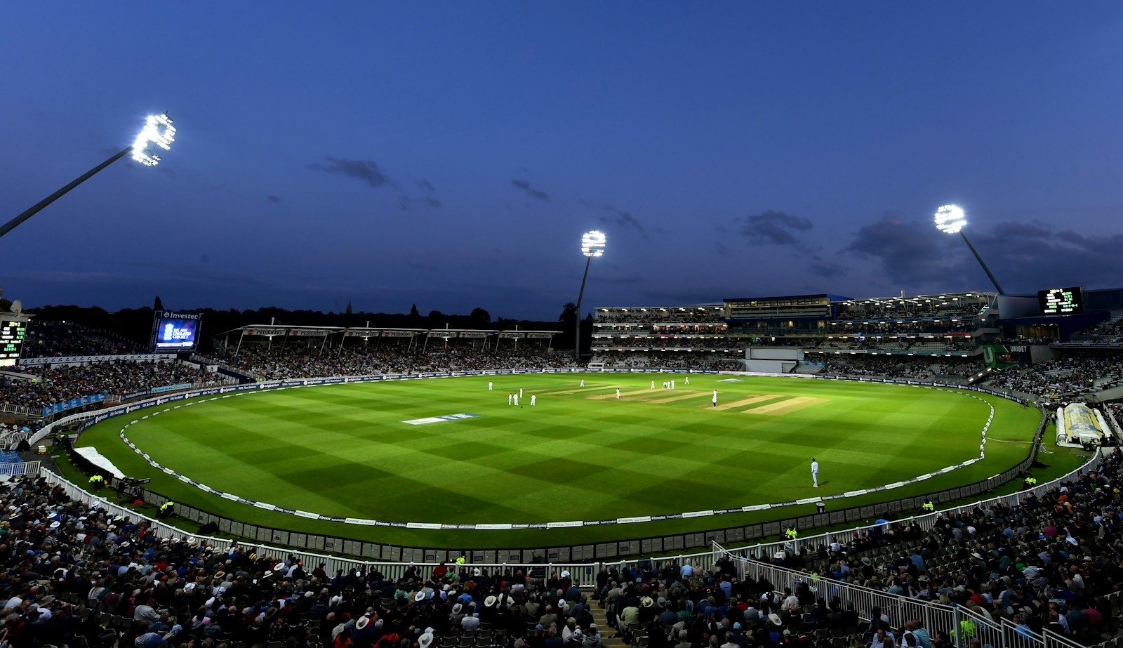Sample photograph of a sports field and crowd under stadium lights